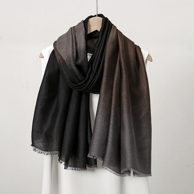 Black and brown gradient scarf on a mannequin against a white background