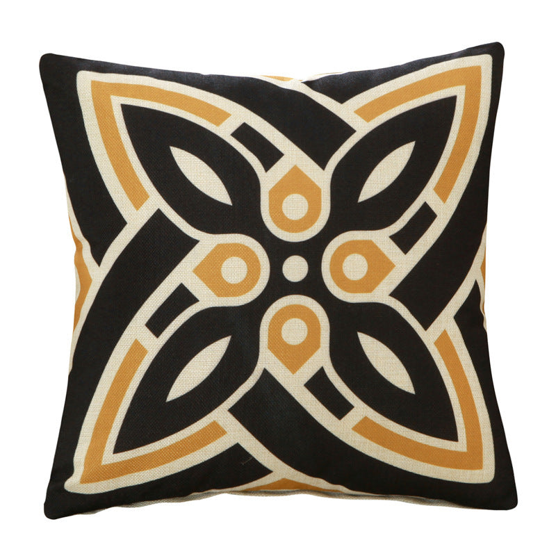 Decorative pillow with geometric pattern on a black background