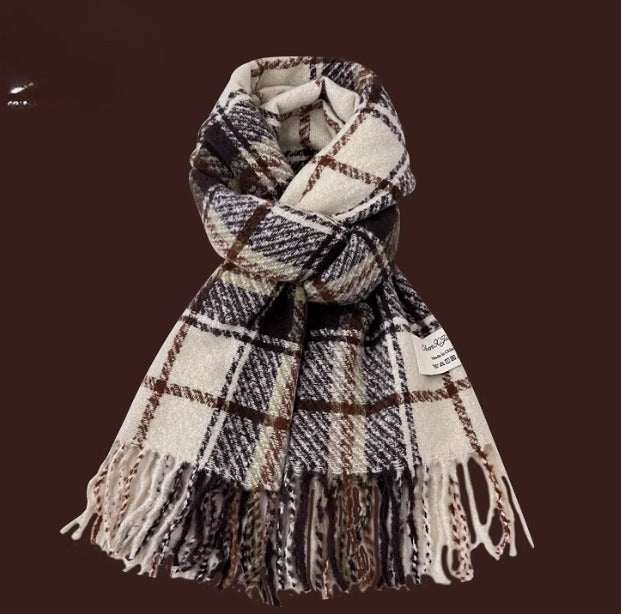 Plaid scarf with fringes on a dark background