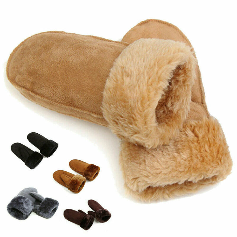 Pair of tan slippers with fur trim and additional slipper parts on a white background