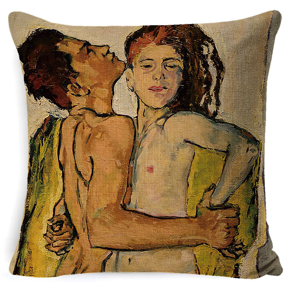 Decorative pillow with artistic depiction of two figures embracing on a beige background