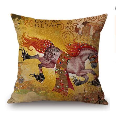 Decorative pillow with a design inspired by Gustav Klimt's art, featuring two horses and intricate patterns.
