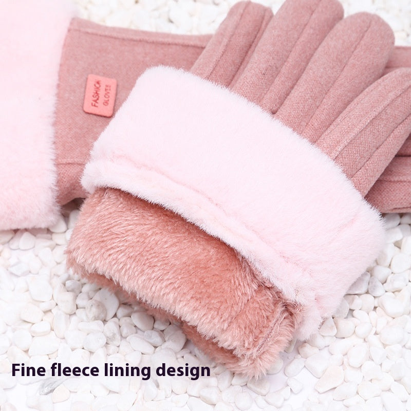 Pink gloves with fleece lining on a white background