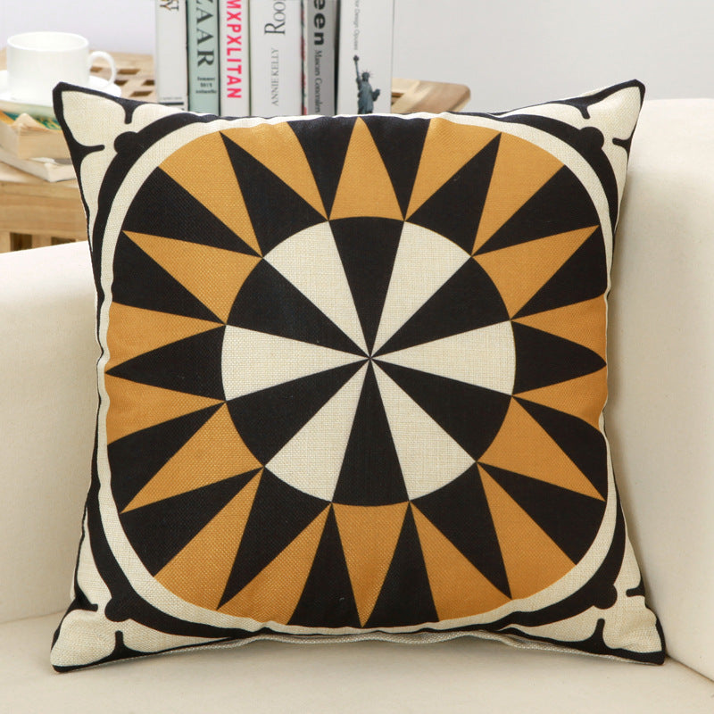 Decorative pillow with geometric pattern on a couch