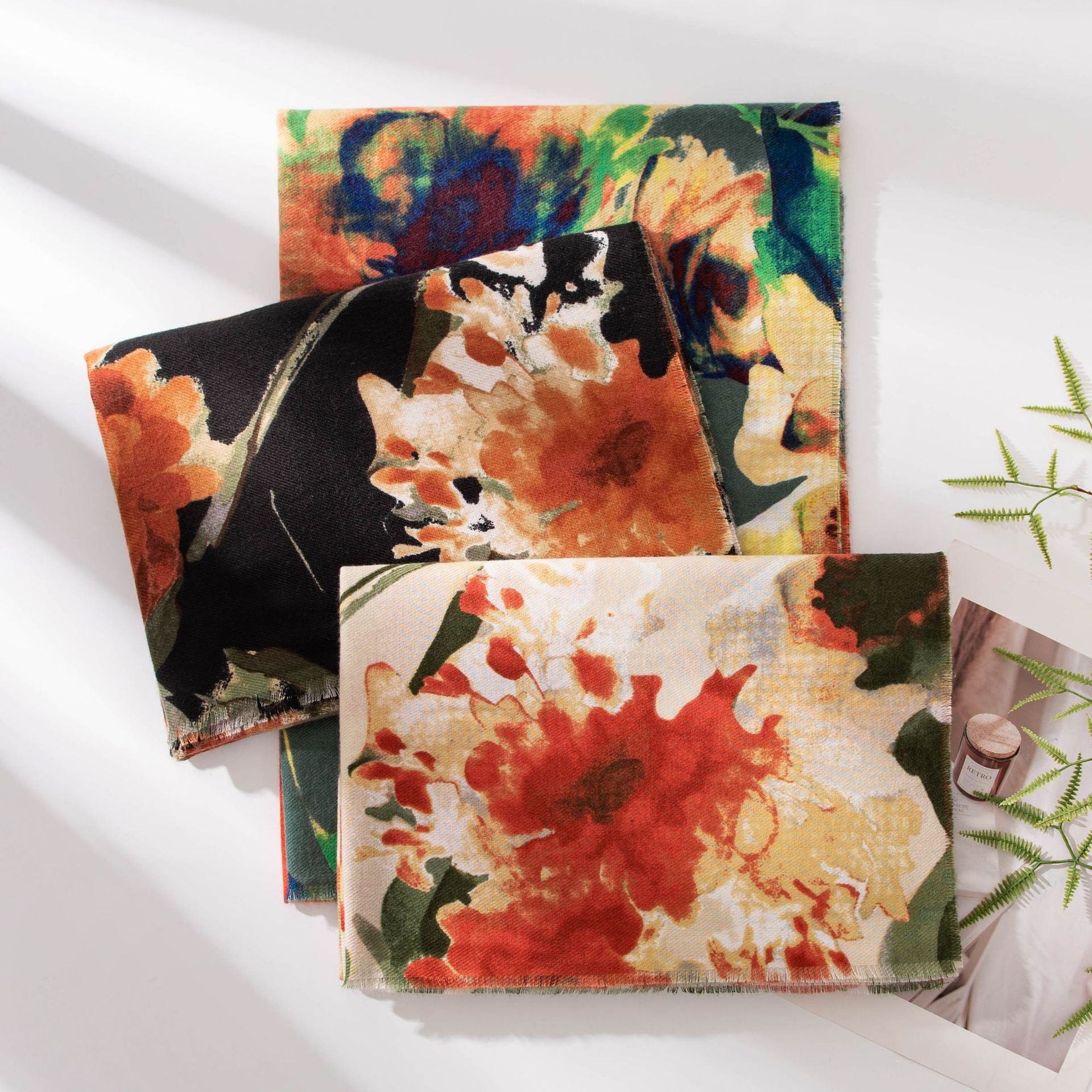 Colorful floral-patterned fabric swatches on a white background
