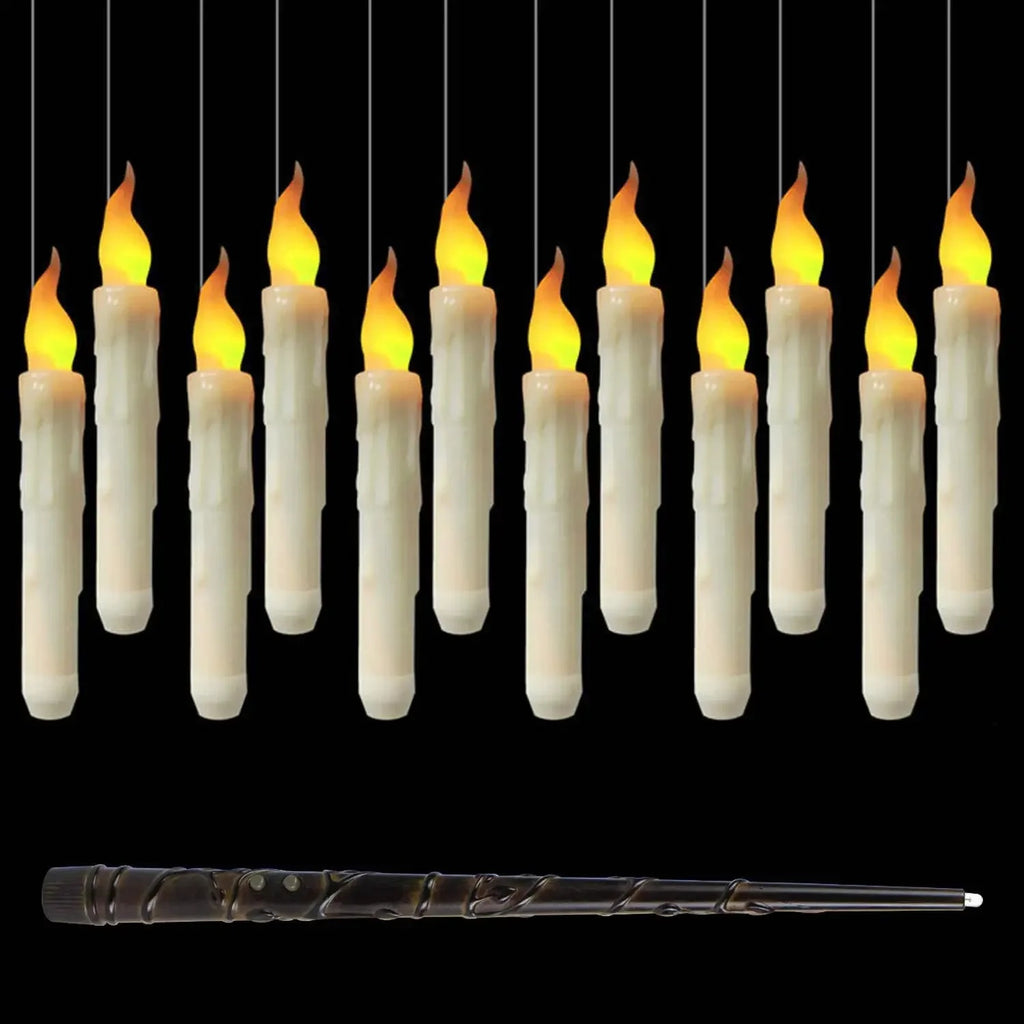 Set of hanging LED candles with a decorative wand on a black background