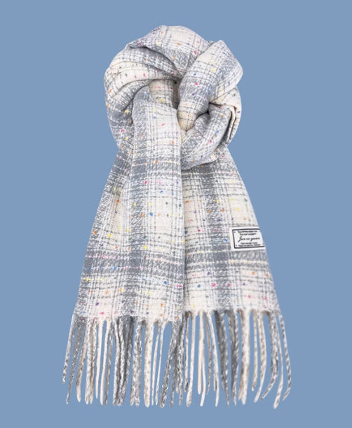Plaid scarf with fringes on a blue background