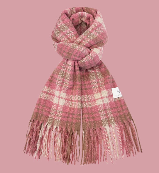 Pink plaid scarf with fringes on a pink background