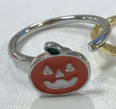 Keychain with a jack-o'-lantern design on a white background