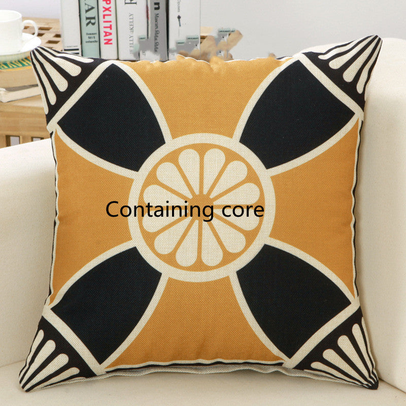 Decorative pillow with geometric pattern on a couch