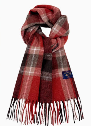 Red plaid scarf with black fringe on a white background
