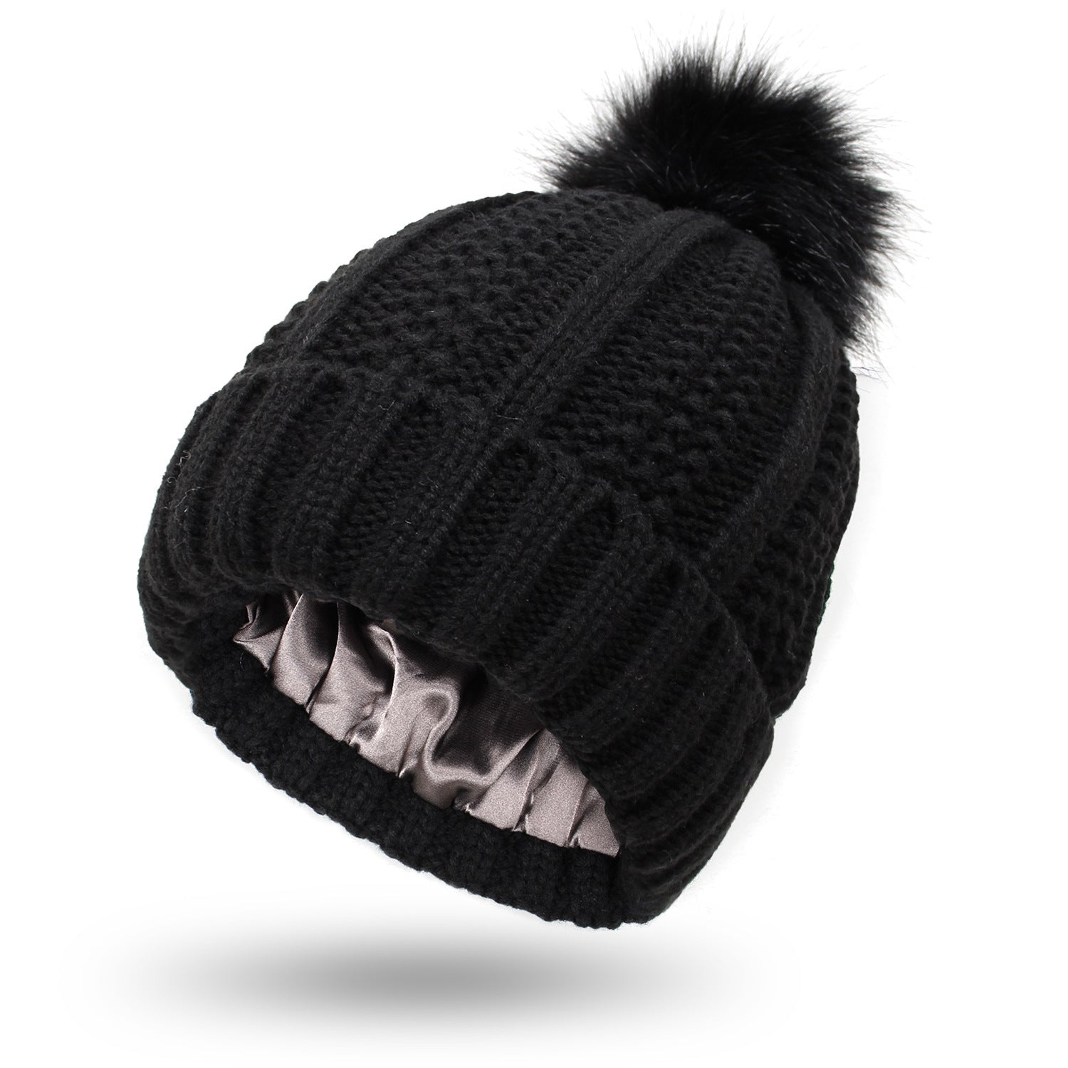 Black knit beanie with a pom-pom on a white background