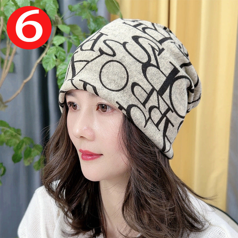 Woman wearing a patterned beanie with a blurred background