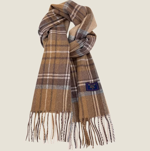 Plaid scarf with fringes on a beige background