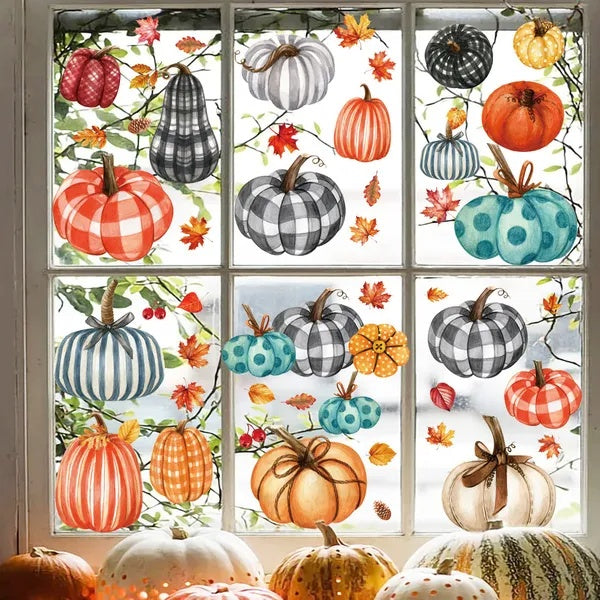 Decorative window film with pumpkins and autumn leaves on a glass pane.