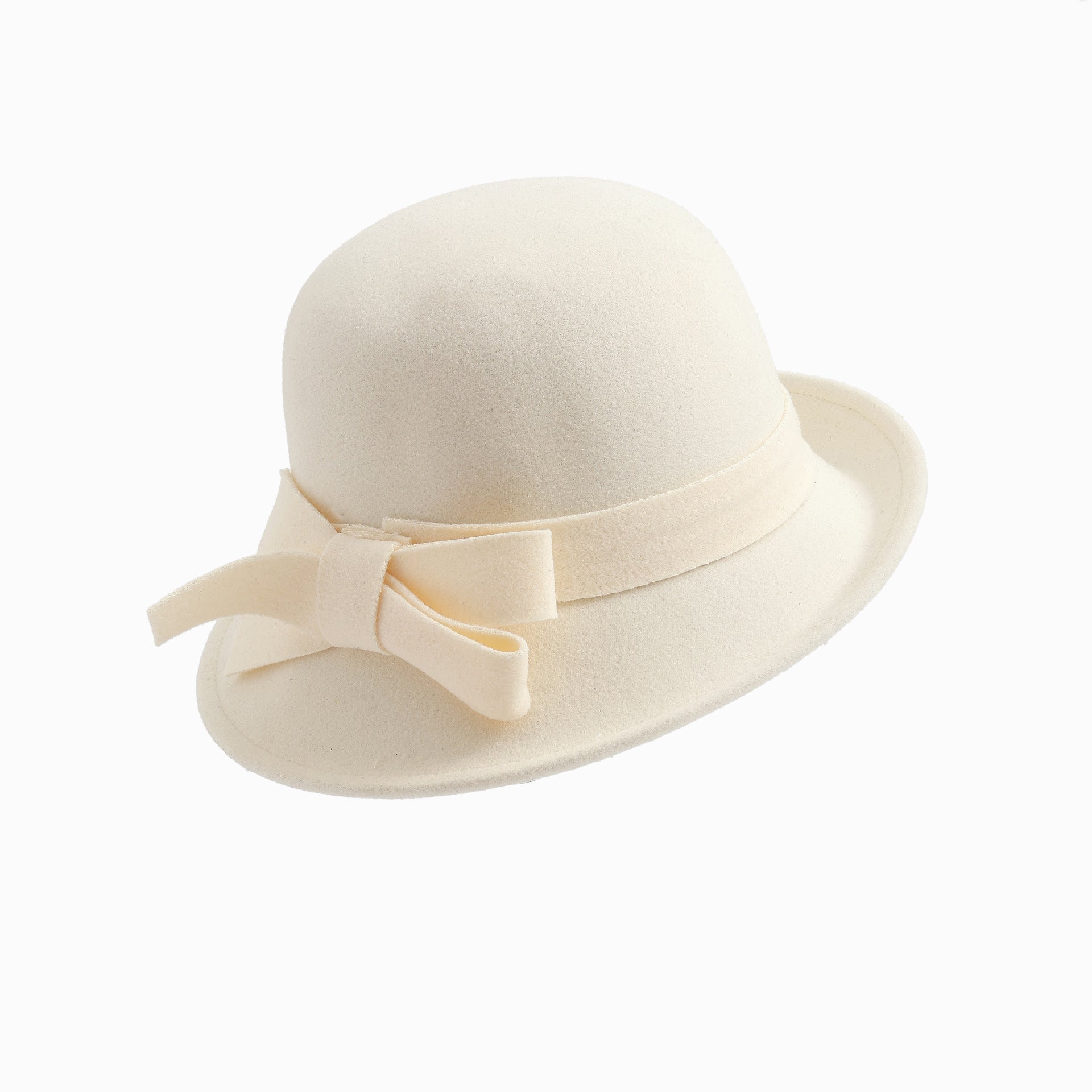 Beige hat with a bow on a white background